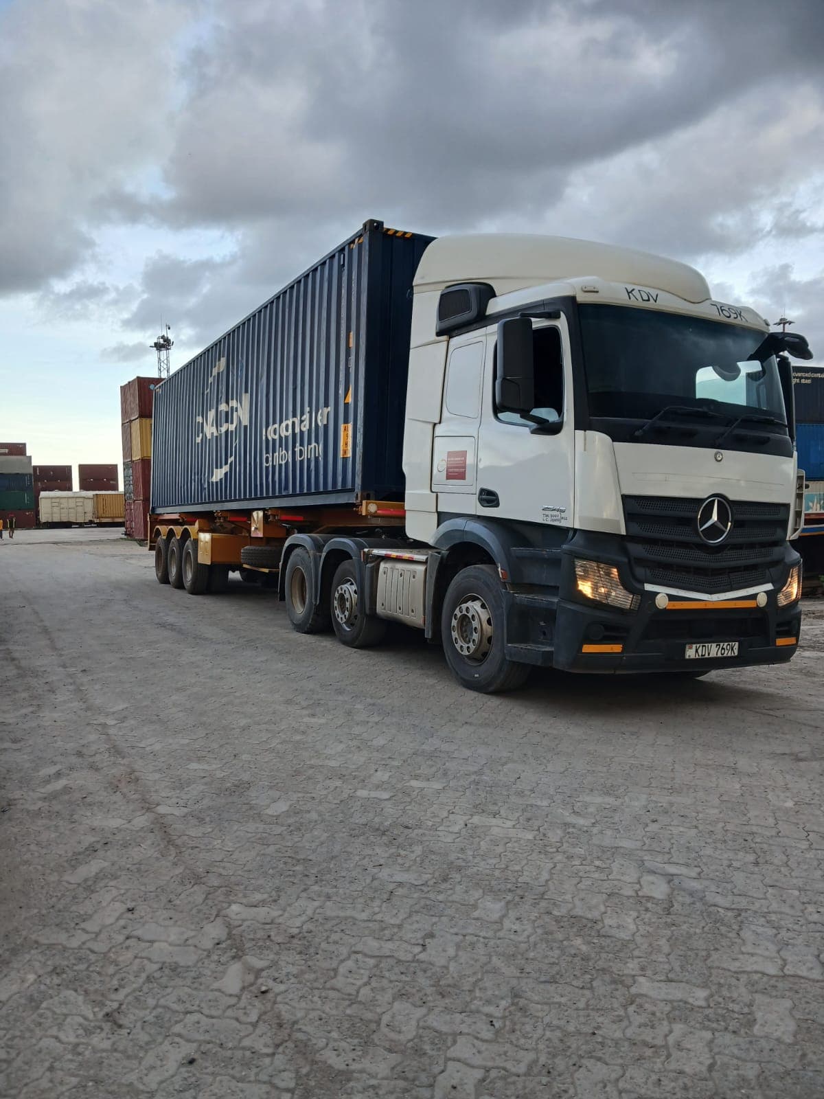 Container tractor-trailer at the yard