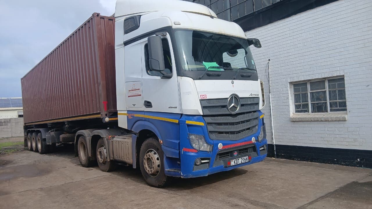 Fleet truck loaded with a container