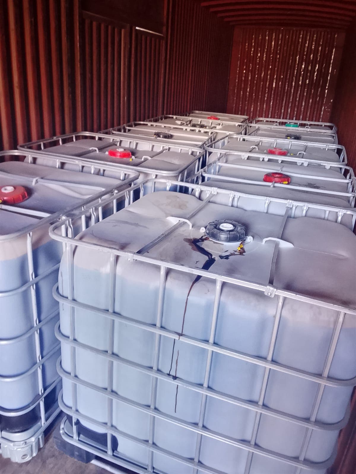 IBC tote shipment staged inside a container